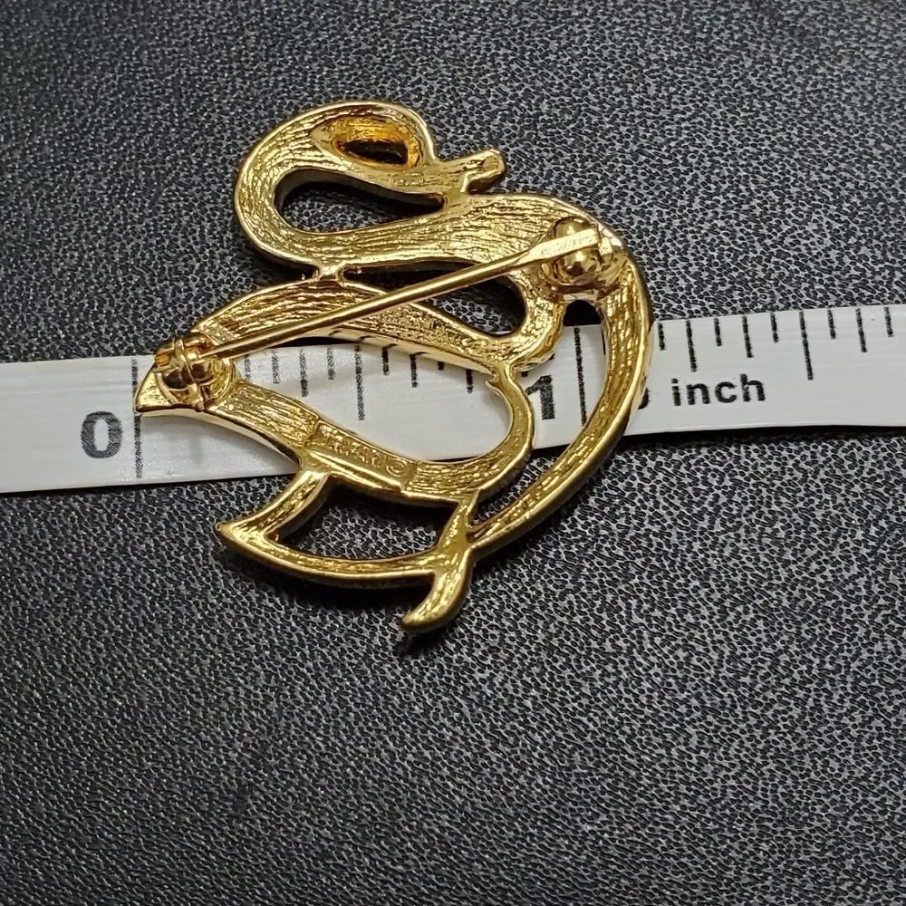 Crown Trifari gold tone swan brooch
